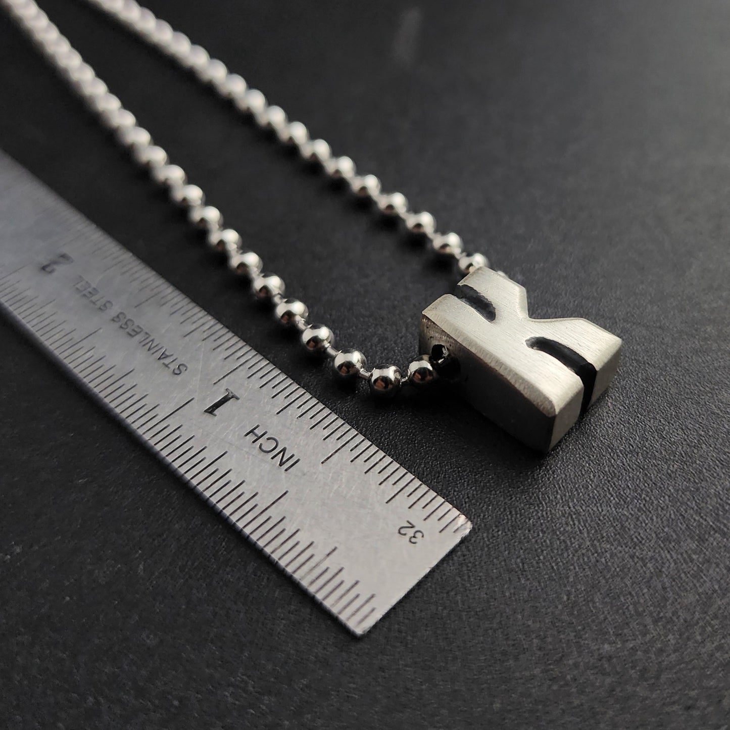 K (silver)