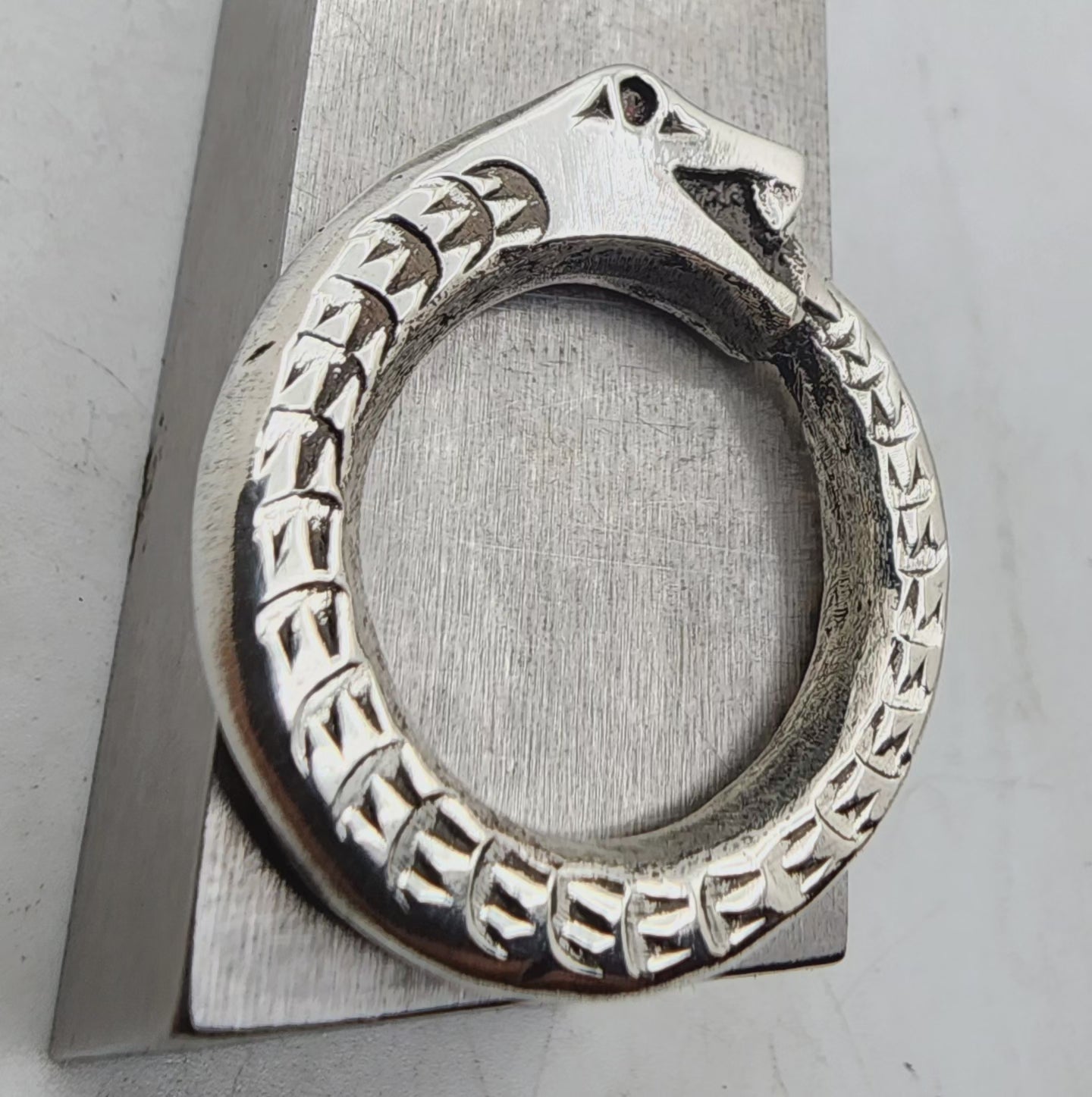 Silver and Garnet Oroborus Ring