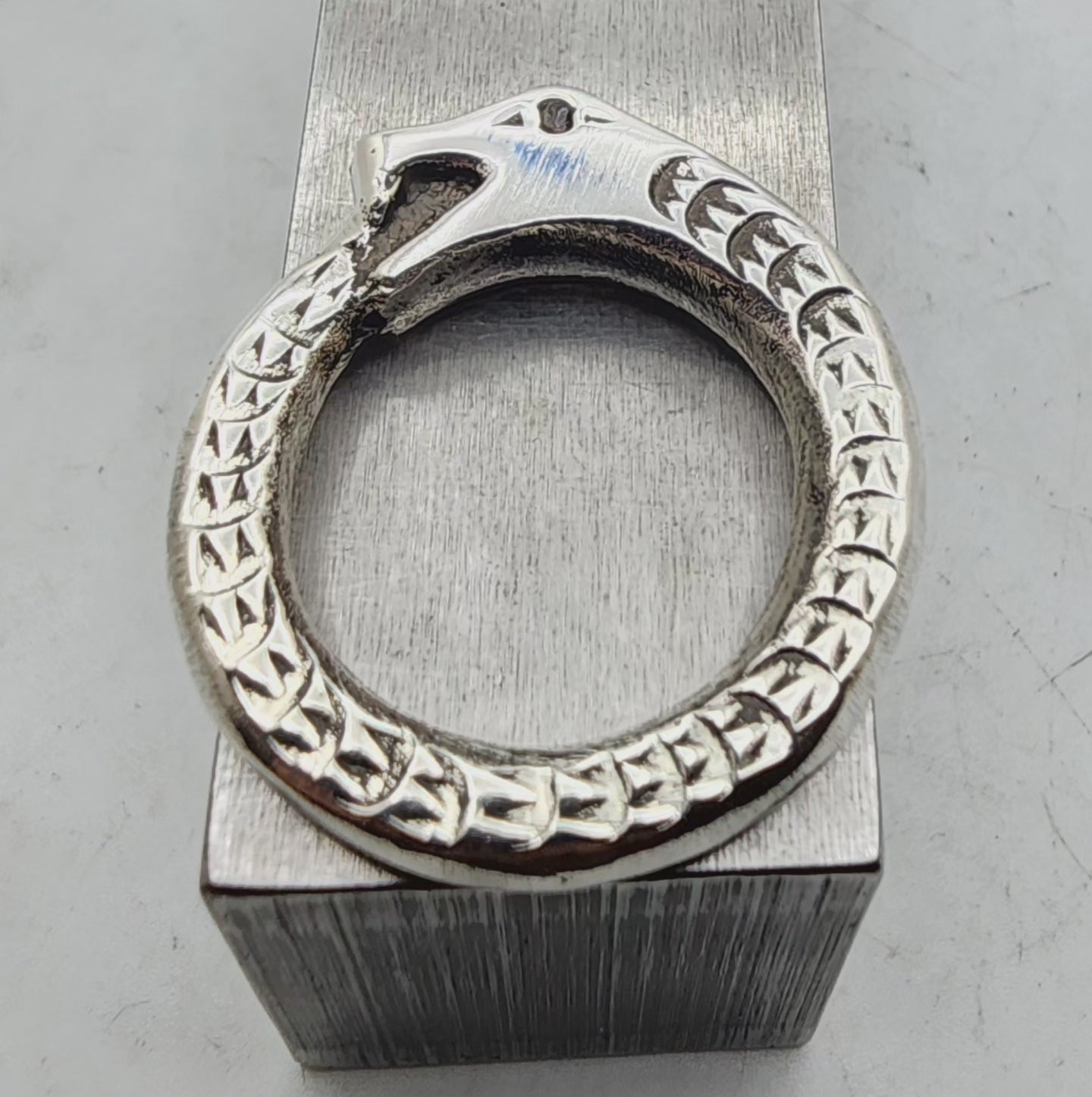 Silver and Garnet Oroborus Ring