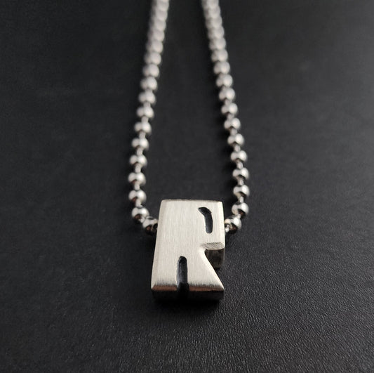 R (silver)