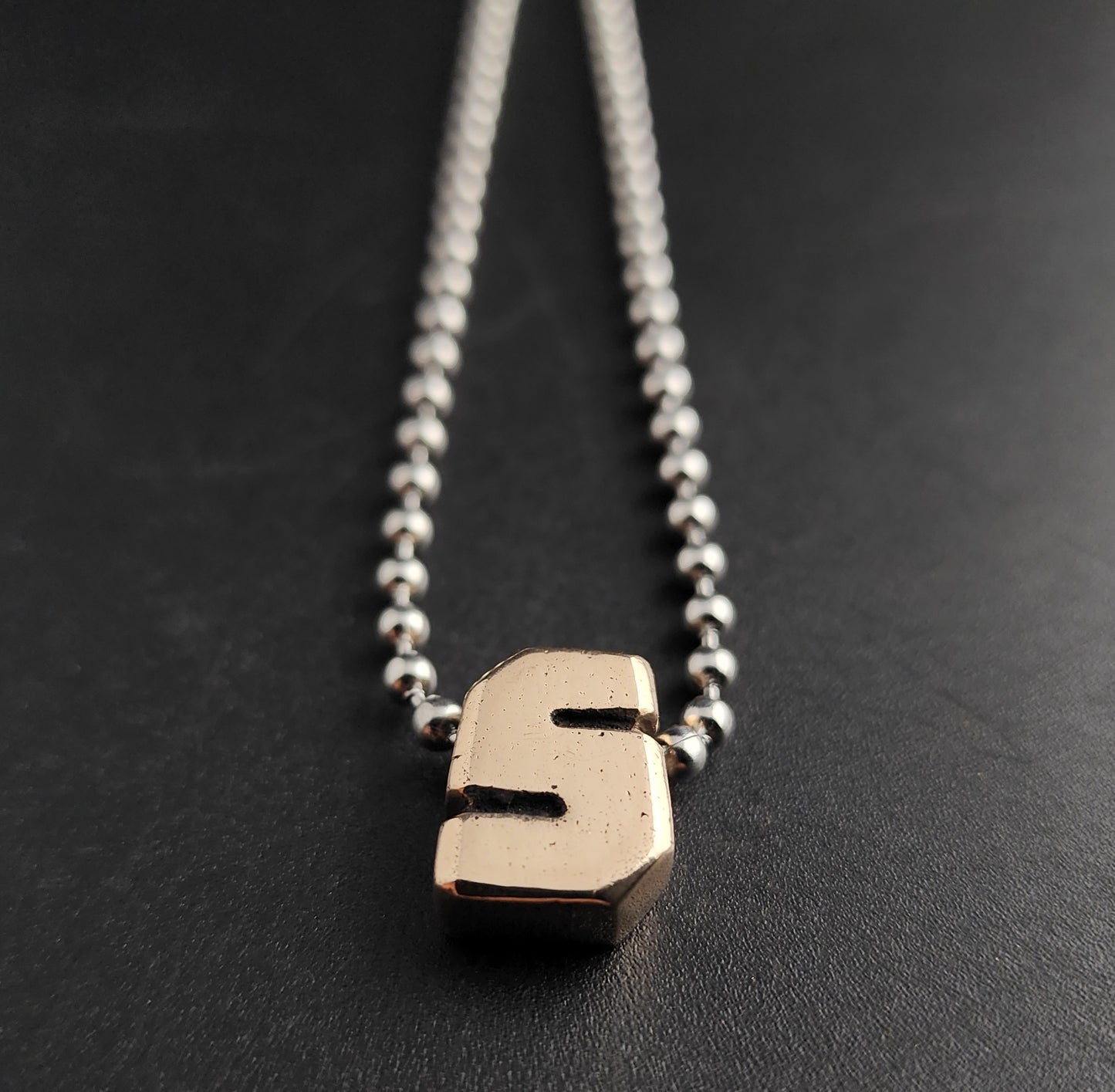 S