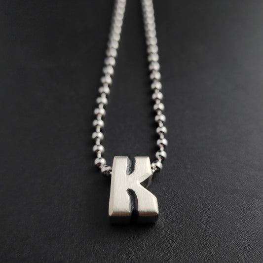 K (silver)