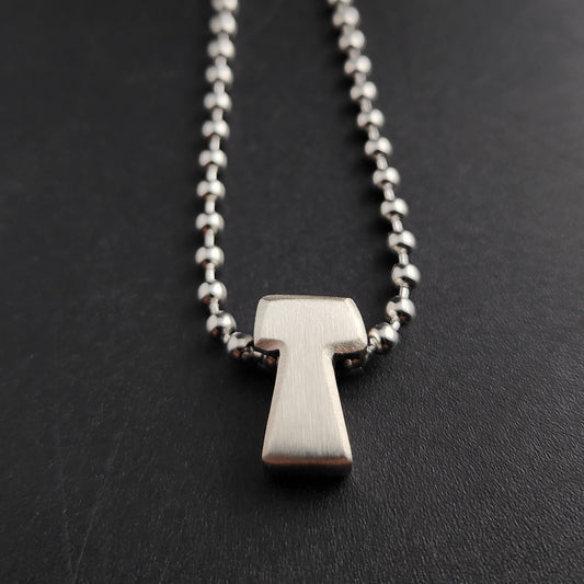 T (silver)