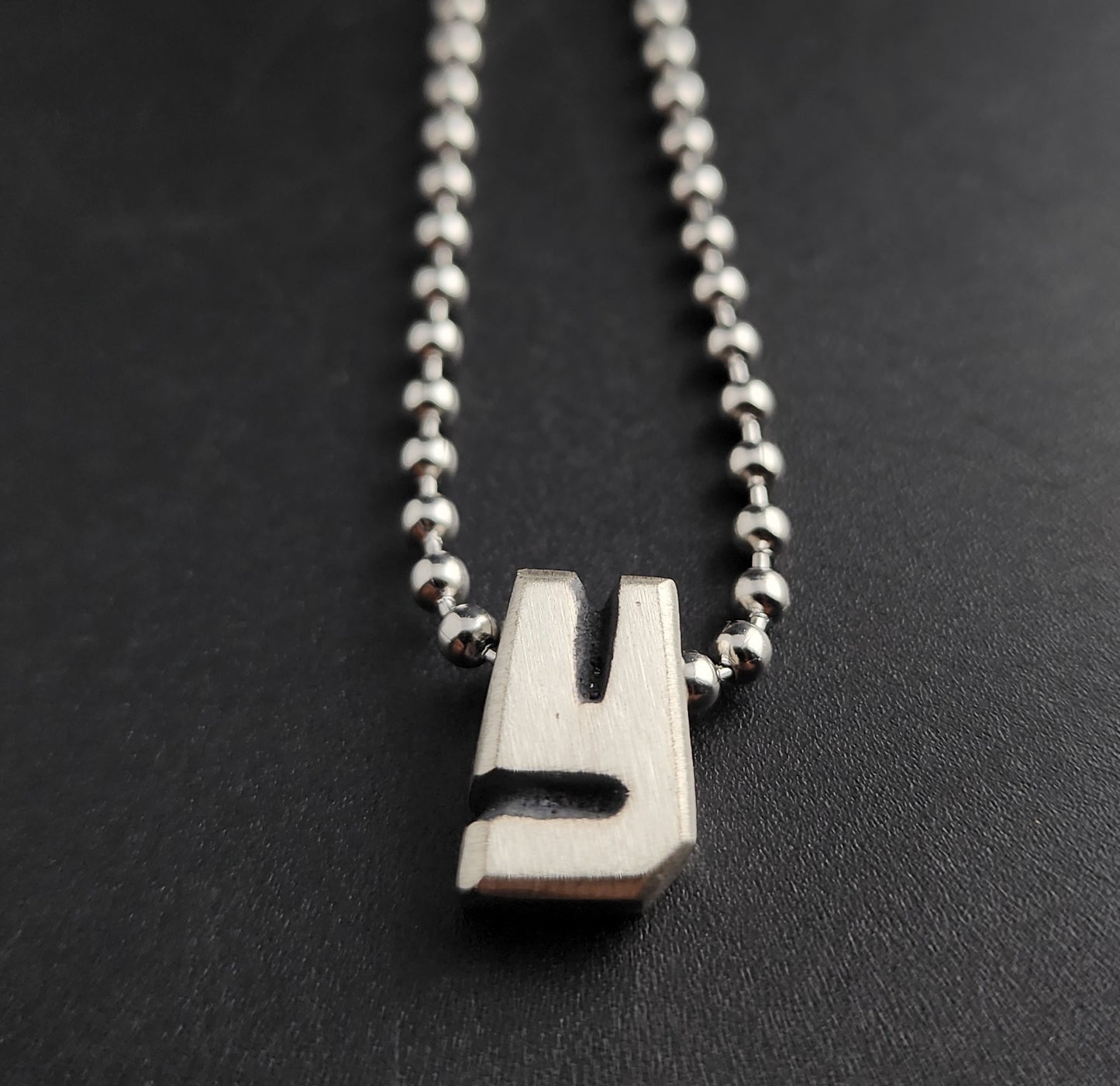 Y (silver)