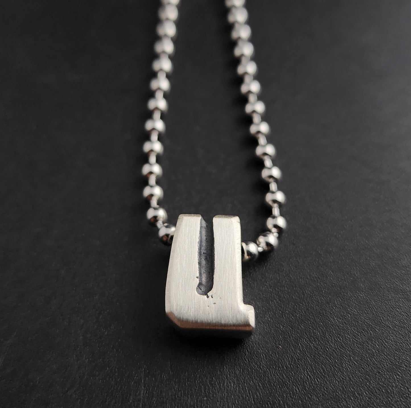 U (silver)