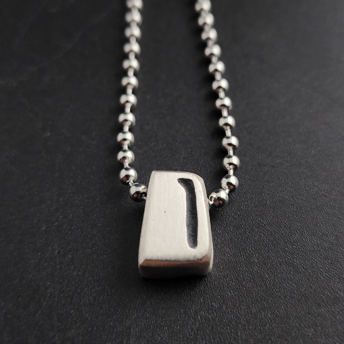 D (silver)