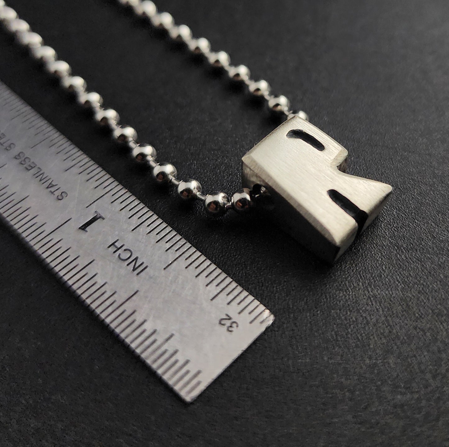 R (silver)