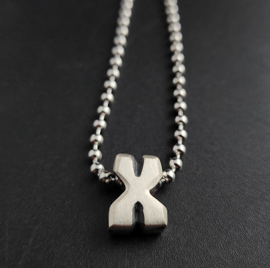 X (silver)