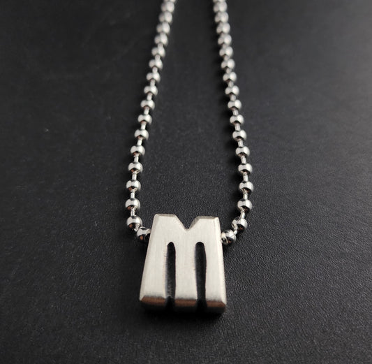 M (silver)