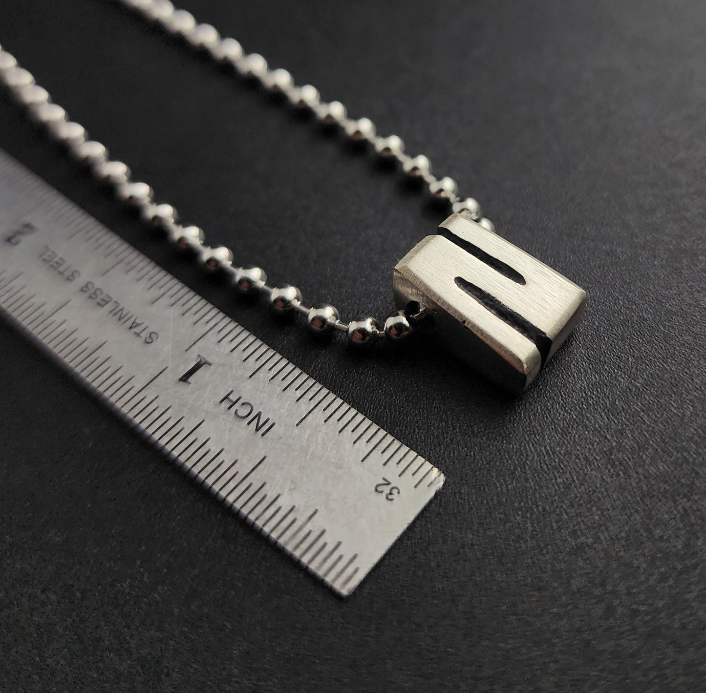N (silver)