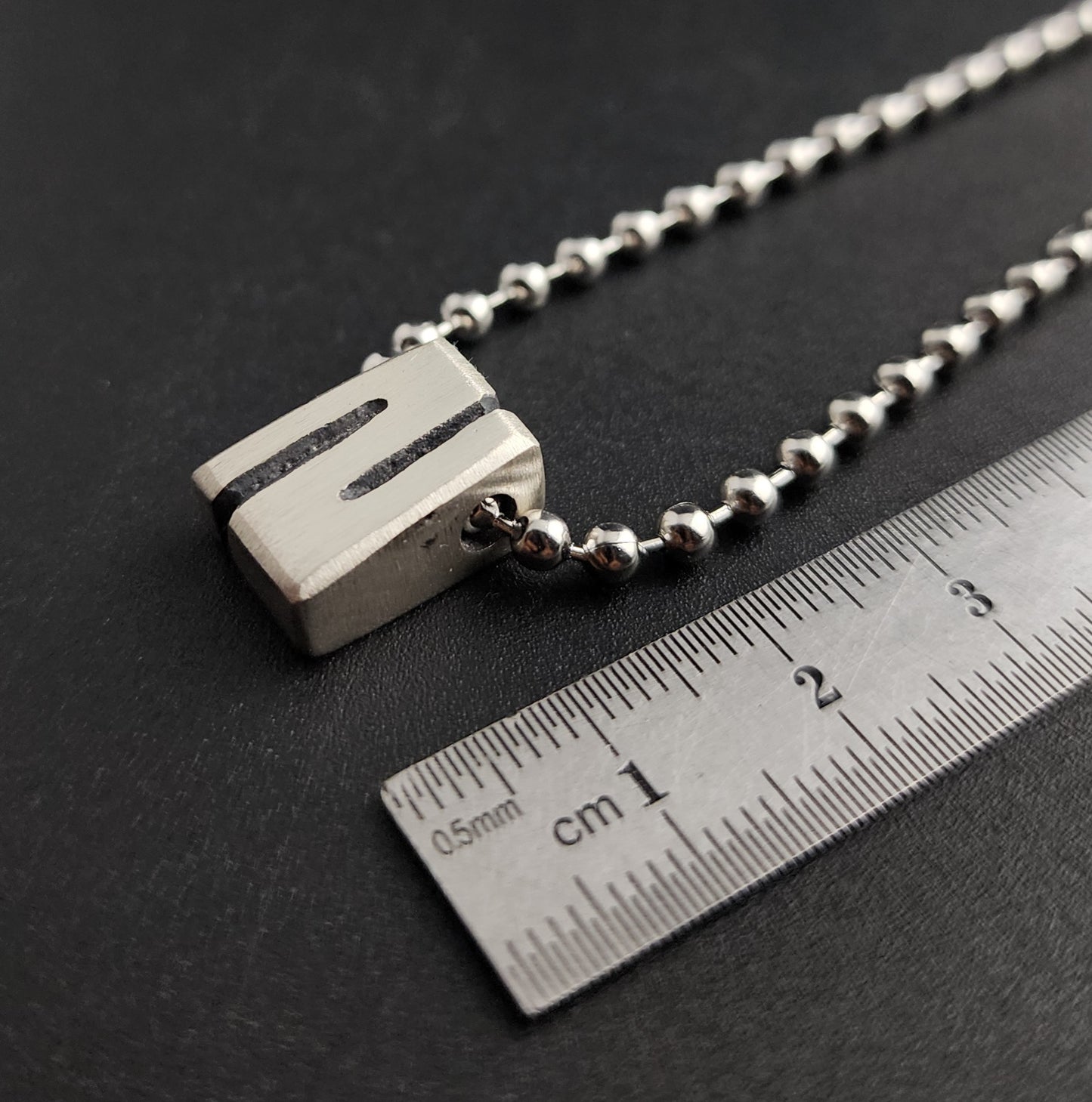 N (silver)