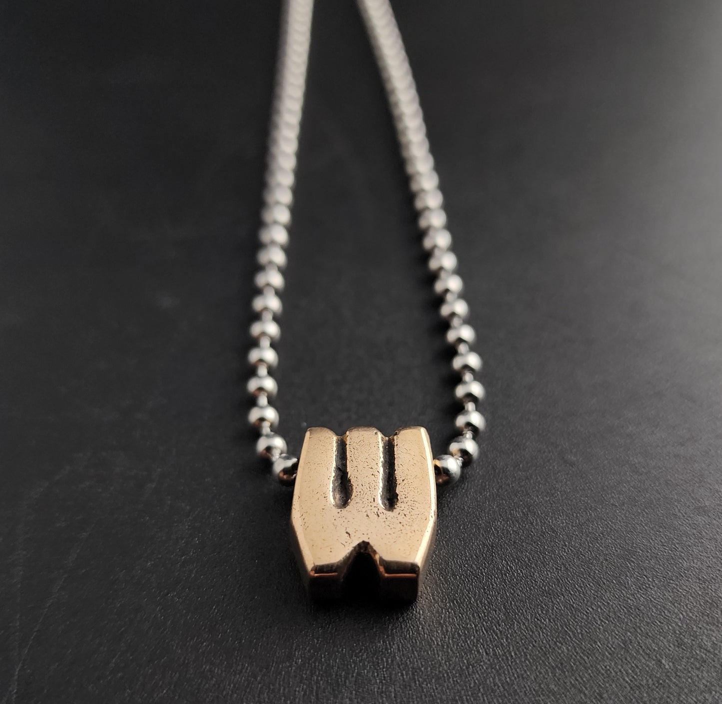 W
